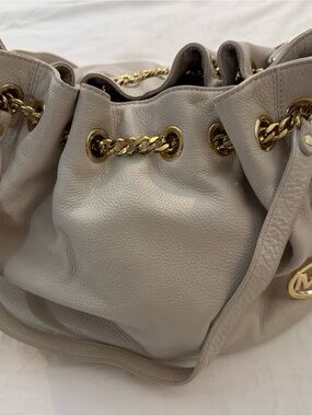 Michael Kors Off-White Pebbled Leather Drawstring Shoulder Bag | Gold Hardware